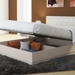 bed with lifting mechanism
